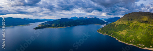 aerial image of the entrance to glencoe  ballachulish and loch leven from loch linnhe on the west coast of the argyll and lochaber region of the highlands of scotland on a clear blue sky summer day