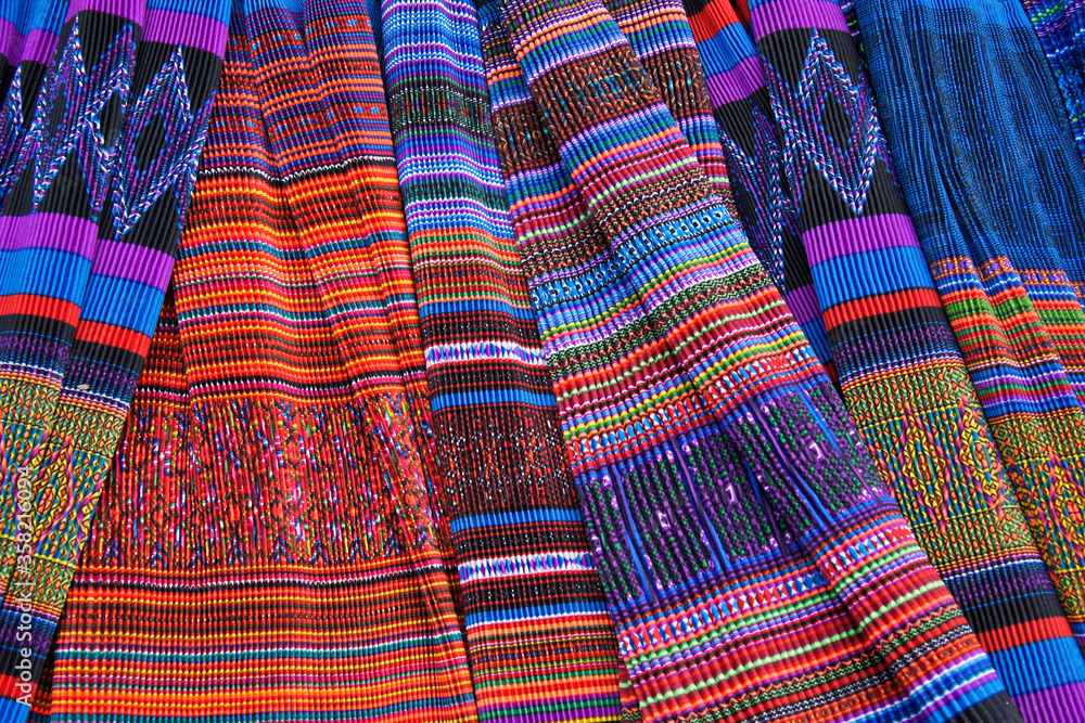 Pleated skirts worn by Flower Hmong women for sale in market, Sapa (Sa Pa), Vietnam Pleated skirts worn by Flower Hmong women for sale in market, Sapa (Sa Pa), Vietnam
