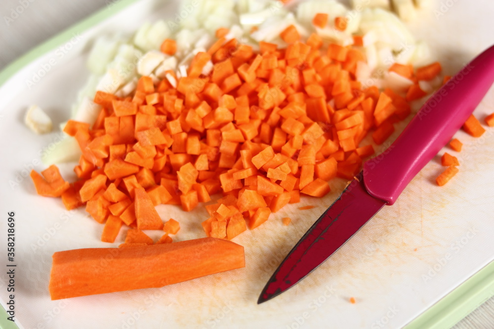Diced carrot, onion and garlic. Making Lasagna Bolognese Series. Diced carrot, onion and garlic. Making Lasagna Bolognese Series.