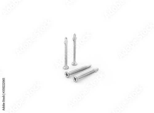 tapping screws made od steel  metal screw  iron screw  chrome screw  screws as a background  wood screw.