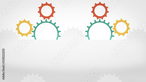 Colorful cogs accurately turning together like one integrated mechanism. photo