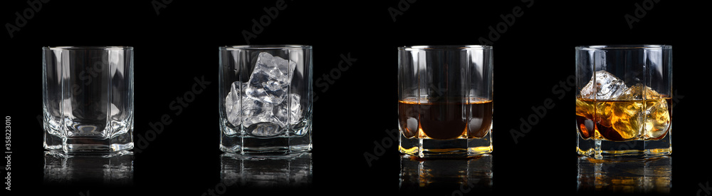 Set of four glasses for alcoholic drinks on black background Set of four glasses for alcoholic drinks on black background