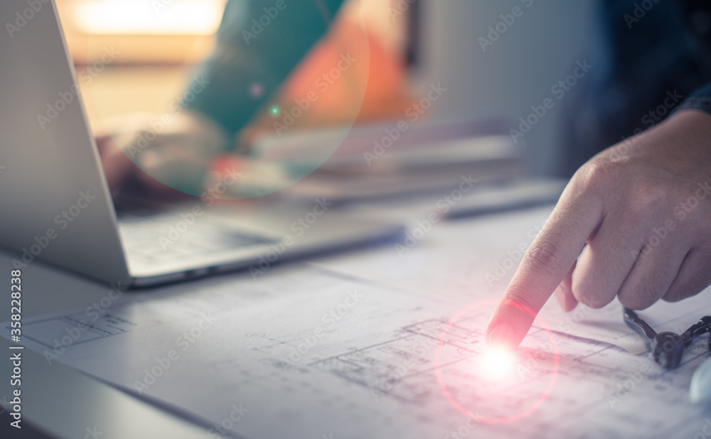 Architect working on blueprint. Architects workplace - architectural ...