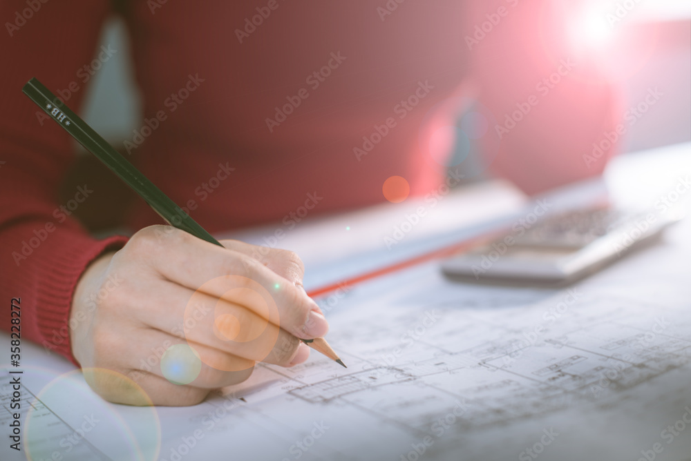 Architect working on blueprint. Architects workplace - architectural ...