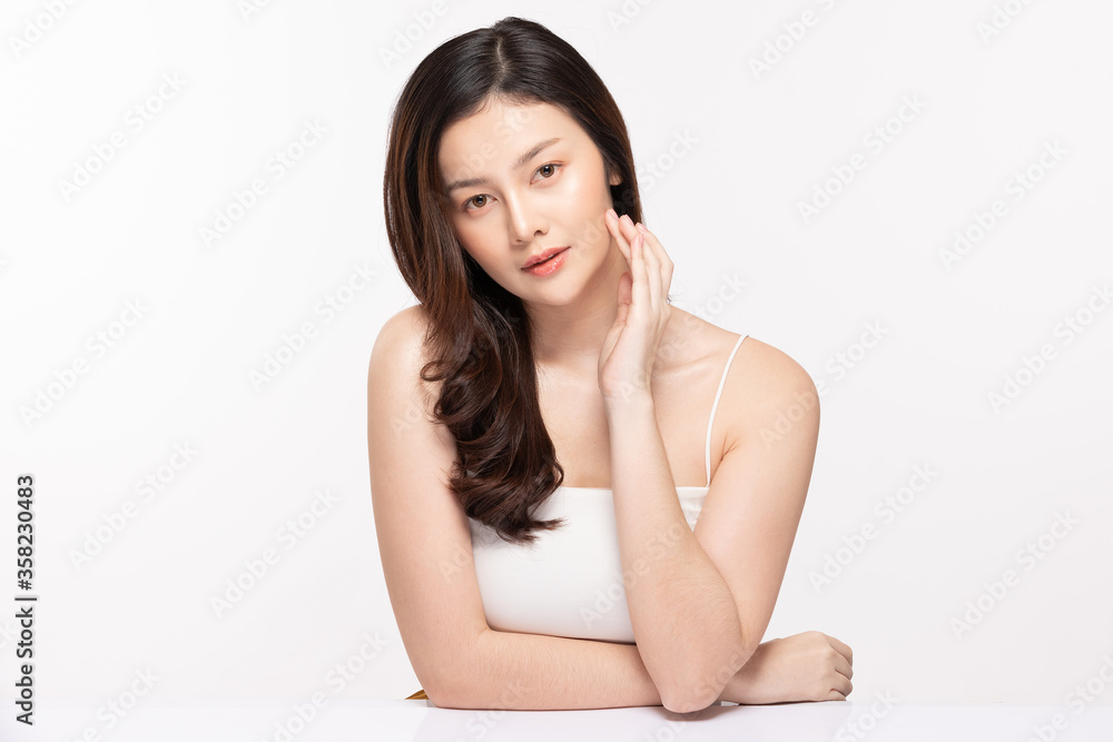 Beautiful Asian young woman touching soft cheek smile Beautiful Asian young woman touching soft cheek smile