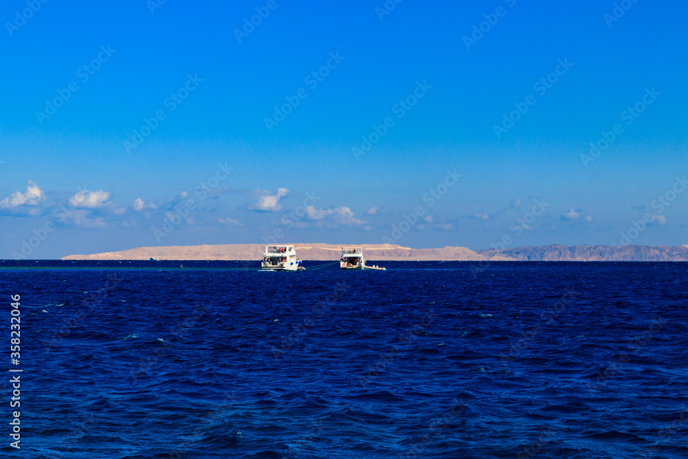 White yachts sailing in Red sea, Egypt