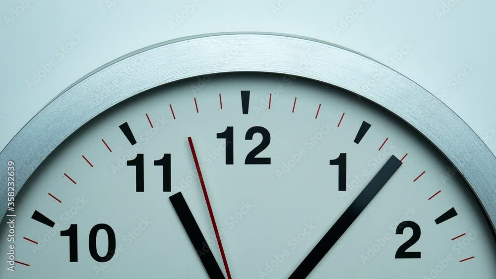 Closeup Gray watch on White Background, beginning of time 11.02 am or pm Closeup Gray watch on White Background, beginning of time 11.02 am or pm