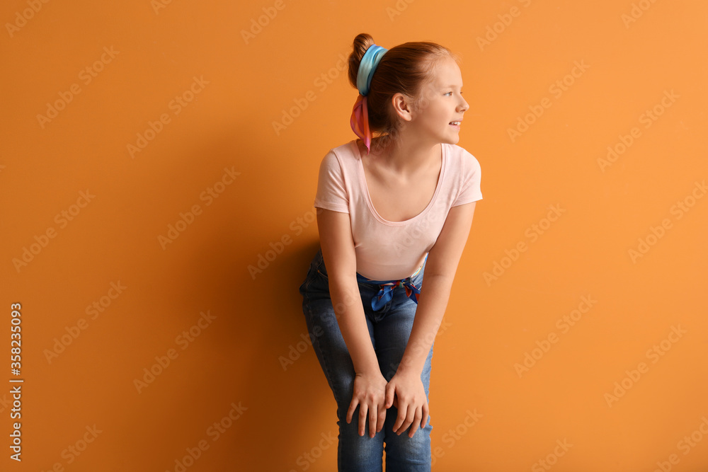 Cute redhead girl on color background Cute redhead girl on color background