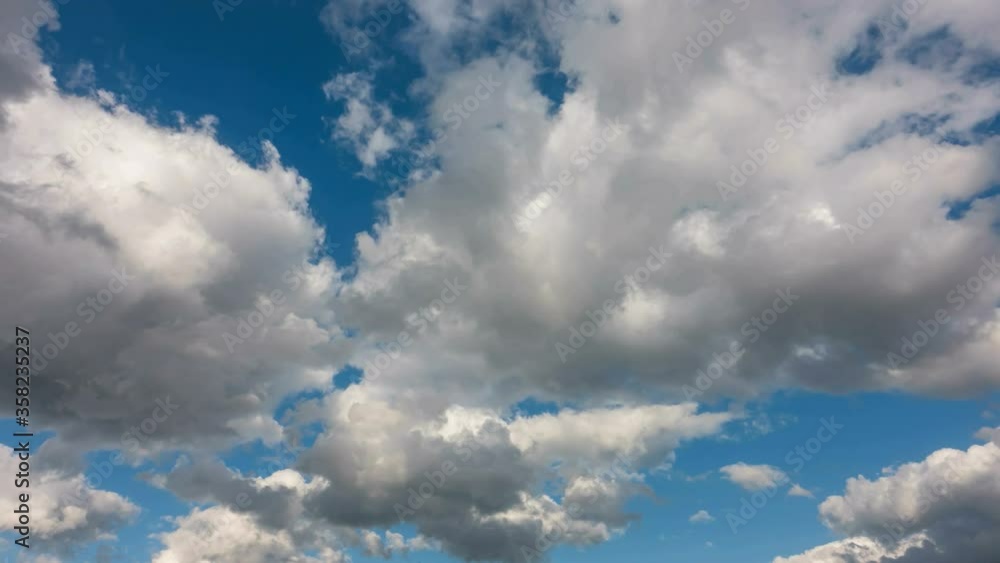 Beautiful blue sky with clouds background. Sky clouds. Sky with clouds weather nature cloud blue. Blue sky with clouds and sun. Loop. Beautiful blue sky with clouds background. Sky clouds. Sky with clouds weather nature cloud blue. Blue sky with clouds and sun. Loop.