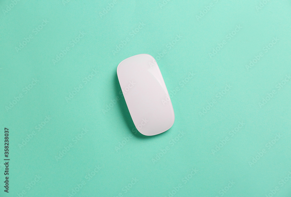 Modern computer mouse on color background Modern computer mouse on color background