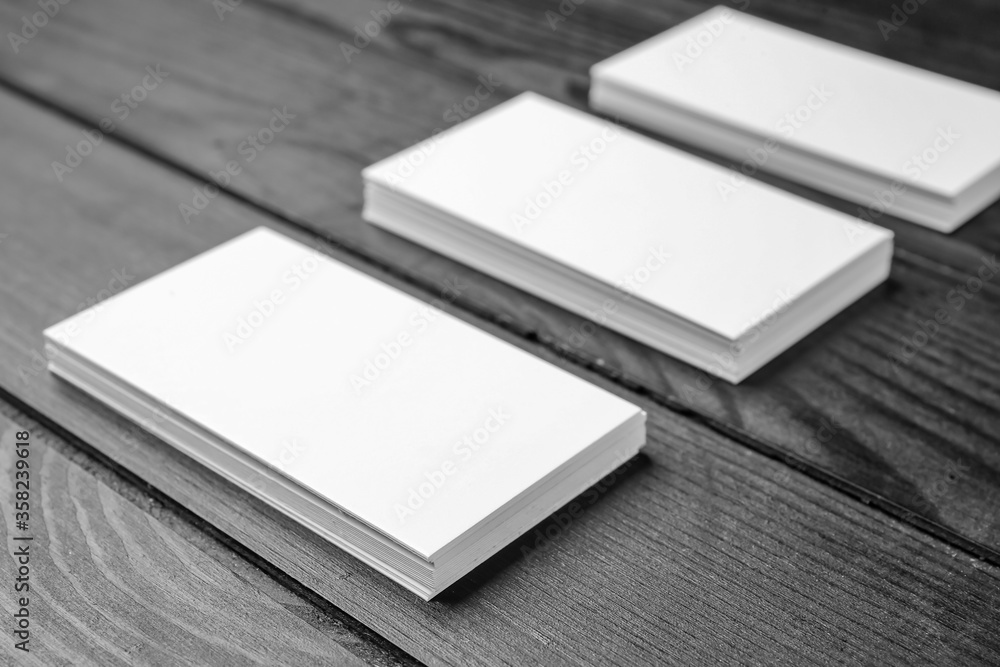 Blank business cards on wooden background Blank business cards on wooden background