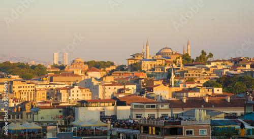 A panorama of Istanbul in the late afternoon sun taken from close to Suleymaniye mosque in Eminonu, Fatih looking towards Sultanahmet. It shows Hagia Sofia in background right & Hagia Eirene