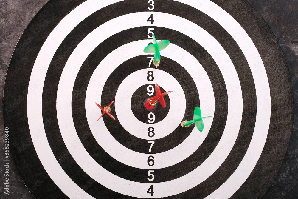 Aim goal, hitting target simply business concept. Dartboard and arrows Aim goal, hitting target simply business concept. Dartboard and arrows