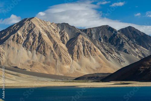 Pangong Tso or Pangong Lake is a lake in the Himalayas situated at a height of about 4,350 m. It is 134 km long and extends from India to the Tibetan Autonomous Region, China. © sorin