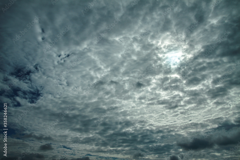 Picturesque clouds in the sky. Window view of an airplane on a sunny gloomy day. Stock photo background Picturesque clouds in the sky. Window view of an airplane on a sunny gloomy day. Stock photo background