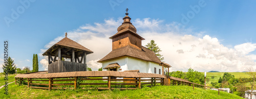 Panoramic view at the Wooden Church of Saint John the Baptist in village Kalna Roztoka, Slovakia photo