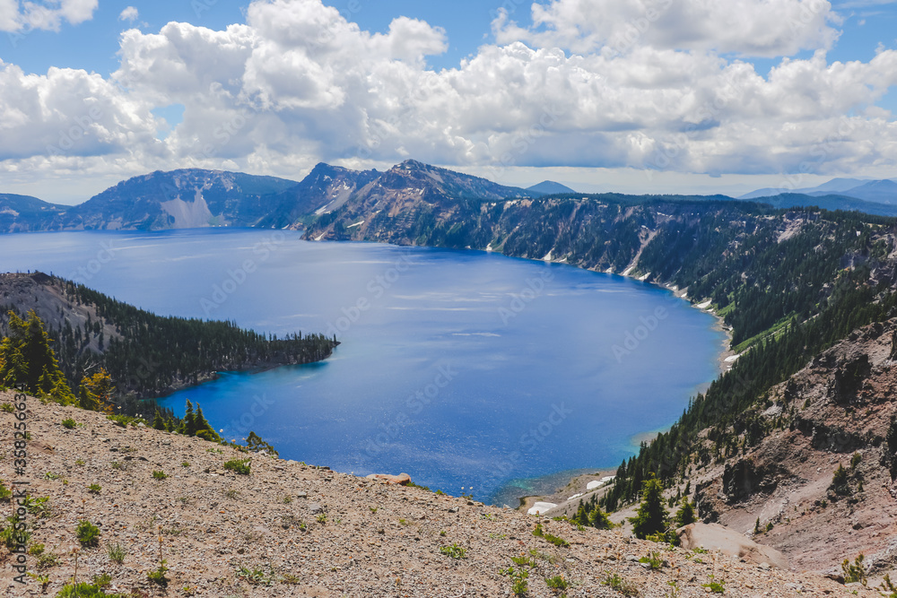 Above of Crater Lake National Park. Beautiful Nature in Summer Season Famous Tourist Attractions in Oregon State, USA. Above of Crater Lake National Park. Beautiful Nature in Summer Season Famous Tourist Attractions in Oregon State, USA.