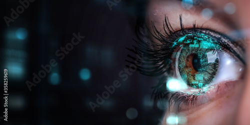 Close up of woman eye in process of scanning photo