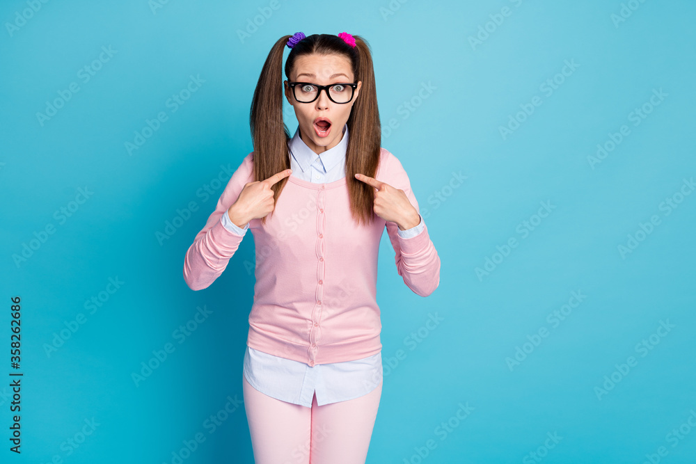 Portrait of her she nice attractive pretty cute funny shy girlish amazed college girl pointing at herself meet take me isolated over bright vivid shine vibrant blue color background Portrait of her she nice attractive pretty cute funny shy girlish amazed college girl pointing at herself meet take me isolated over bright vivid shine vibrant blue color background