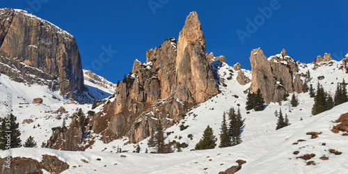 Panoramic landscape of the winter rocky mountains in the Dolomites Alps in Italy.