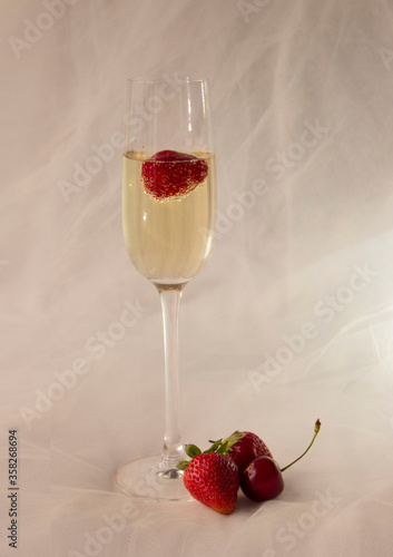 Heart shaped strawberries in champagne