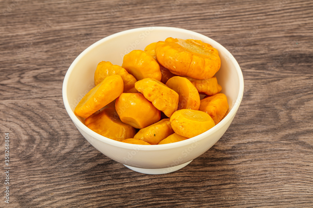 Marinated yellow patisson in the bowl Marinated yellow patisson in the bowl