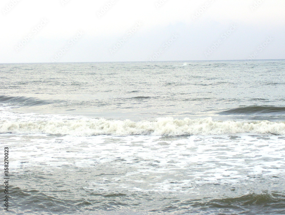 Sea beach with waves