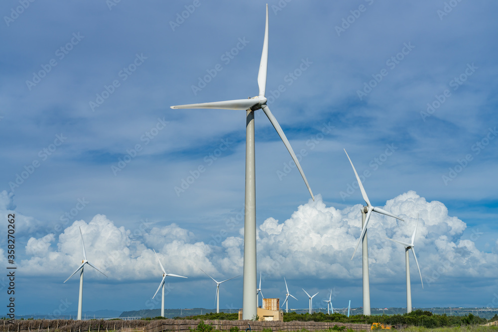 Wind turbines in Taichung Port Gaomei Wetlands Area. A popular scenic spots in Qingshui District, Taichung City, Taiwan Wind turbines in Taichung Port Gaomei Wetlands Area. A popular scenic spots in Qingshui District, Taichung City, Taiwan