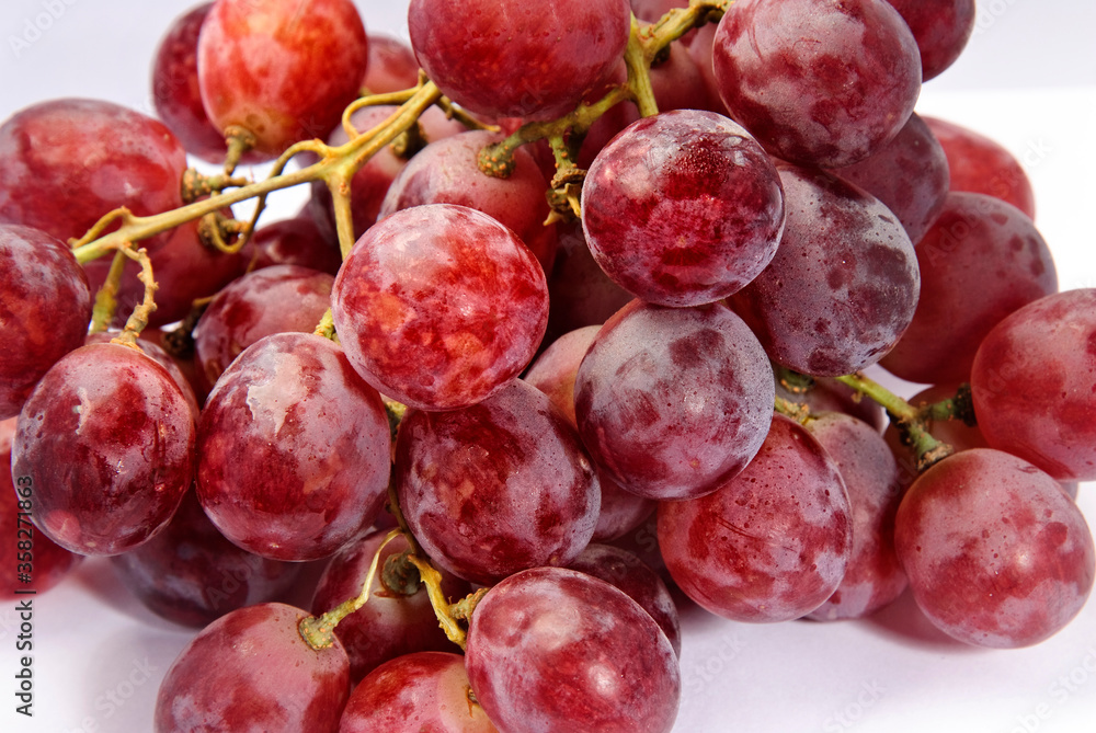 Red grape with water drops, closeup background Red grape with water drops, closeup background