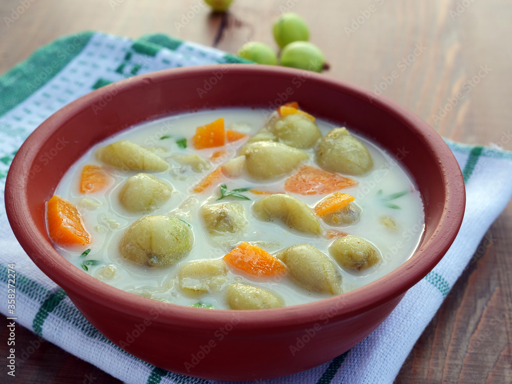 Refreshing gooesberry soup. Traditional Hungarian summer fruit dish, sweet-sour refreshment.