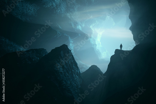 man exploring big cave, sur...