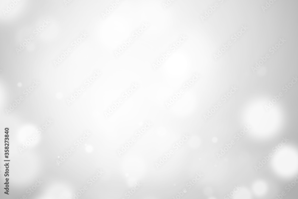 Bokeh abstract blurred silver and white beautiful background. Soft color light glitter sparkles. element for backdrop or design cosmetic ads, winter, christmas, luxury, beauty, baby, modern, creative Bokeh abstract blurred silver and white beautiful background. Soft color light glitter sparkles. element for backdrop or design cosmetic ads, winter, christmas, luxury, beauty, baby, modern, creative
