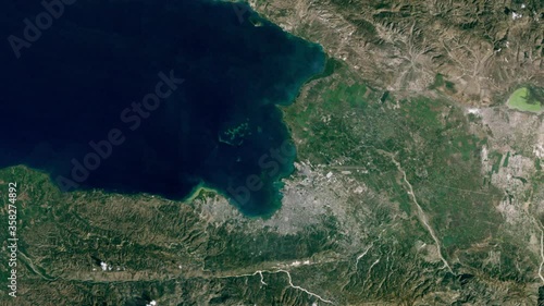 Satellite view time lapse city growth urban expansion animation , Port au prince Haiti. Images furnished by Nasa photo