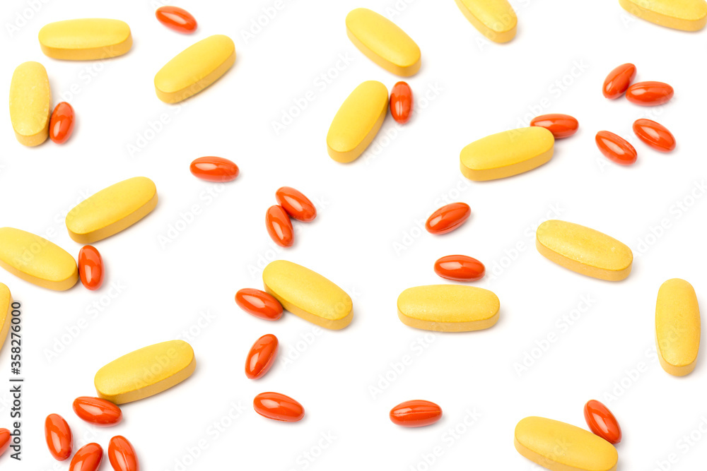 Multivitamin and mutimineral pills, nutritional Supplement on white background in close-up Multivitamin and mutimineral pills, nutritional Supplement on white background in close-up