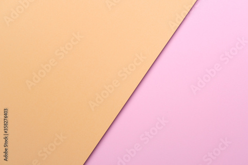 Pastel orange and pink paper color for background.