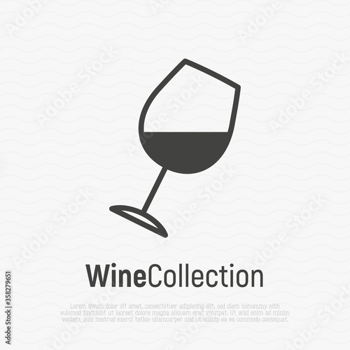 Logotype of wine and wine making. Tilted wine glass thin line icon. Vector illustration.