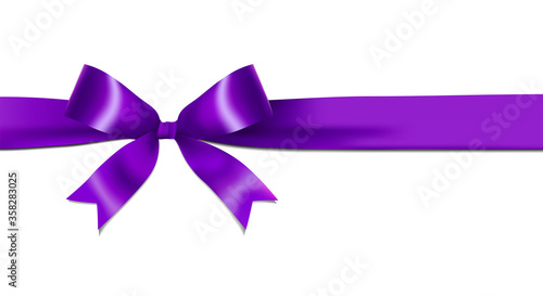 Shiny purple ribbon bow isolated on white background with copy space. For using special days.  © 12bit