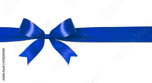 Shiny dark, navy blue ribbon bow isolated on white background with copy space. For using special days. 