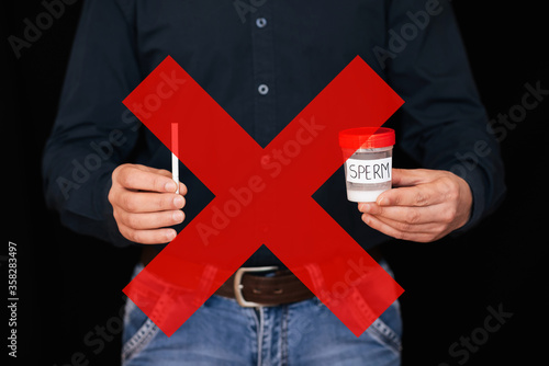 Photos can of semen and a cigarette in the hands of a male smoker