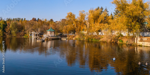 Sunny autumn evening on the blue lake