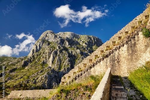 Path or road in frotress mountains Kotor fort Montenegro beautiful tourism travel concept. Vacation mediterranean Europe trip. Bright summer landmark landscape panorama photo