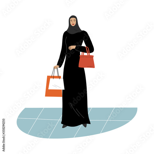 Muslim girl in a traditional ethnic black hijab standing with shopping bags. Vector illustration in flat cartoon style.