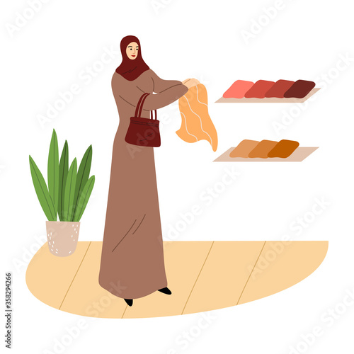 Muslim girl in a traditional ethnic brown hijab choose fabrics in the store. Vector illustration in flat cartoon style.