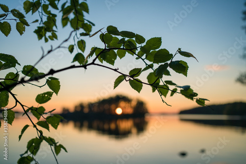 finnish summer sunset midsummer bright outside lakeside photo