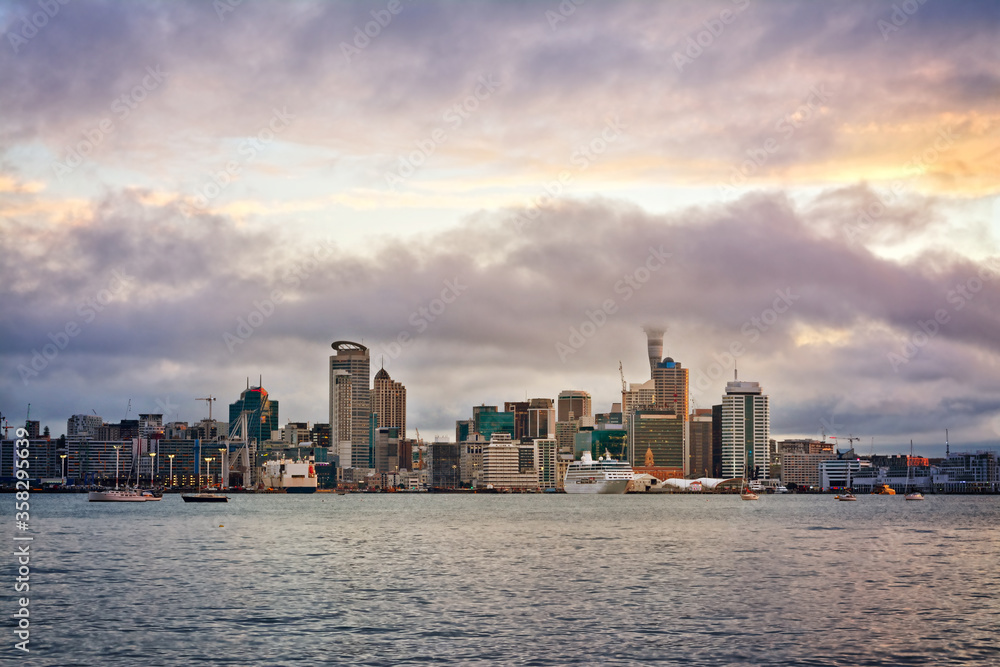 Auckland City downtown skyline at sunset.