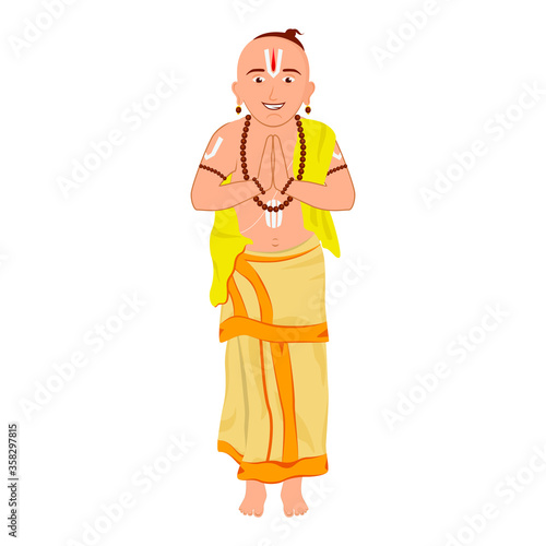 South Indian priest with a folded hand doing namaskar in a very traditional style.