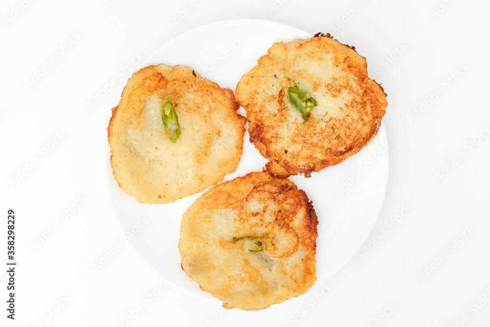 Potato pancake on white background