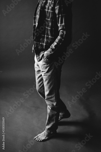 Details of body black and white portrait of man, fashion and art studio portrait of man © Наташ Сергеева