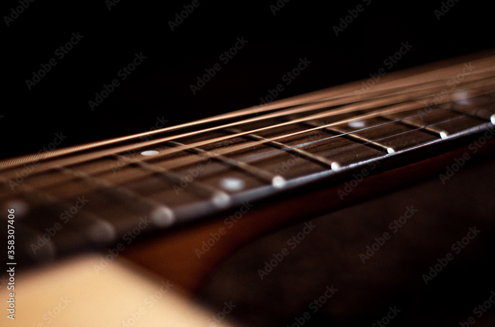 Fototapeta premium Acoustic Guitar on Black Background