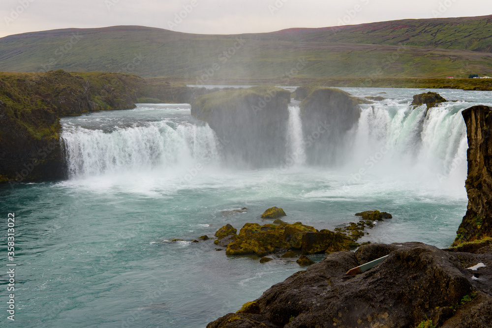 Godafoss (waterfall of the gods) in the Bardardalur district of Northeastern Region of Iceland Godafoss (waterfall of the gods) in the Bardardalur district of Northeastern Region of Iceland